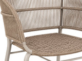 Detail van de Kane tuinstoel van Max & Luuk in Linen, met beige koordwerk rond de rug, armleuningen en zitting.